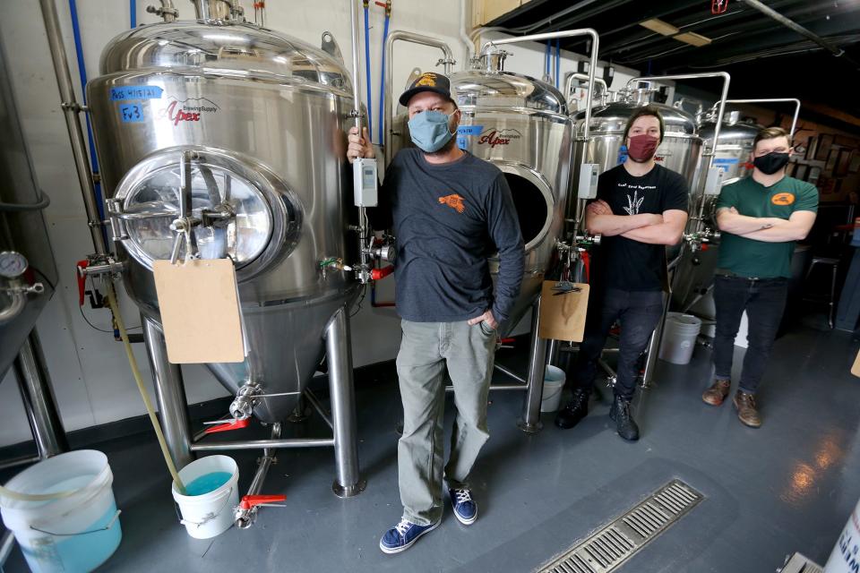 From left, owner and head brewer Alex McDonald, lead brewer Jared Richard and tap room manager Blake Seale Jr. opened the second location of Earth Eagle Brewings in Somersworth in April 2021.