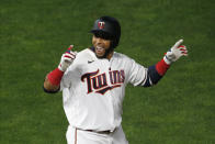 Minnesota Twins' Nelson Cruz celebrates his winning RB-single off Pittsburgh Pirates pitcher Nick Burdi in the ninth inning of a baseball game Monday, Aug. 3, 2020, in Minneapolis. (AP Photo/Jim Mone)