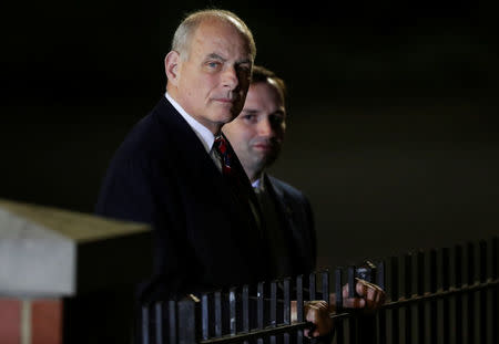 White House Chief of Staff John Kelly looks on before to greet the arrival of the three Americans formerly held hostage in North Korea, at Joint Base Andrews, Maryland, U.S., May 10, 2018. REUTERS/Jim Bourg