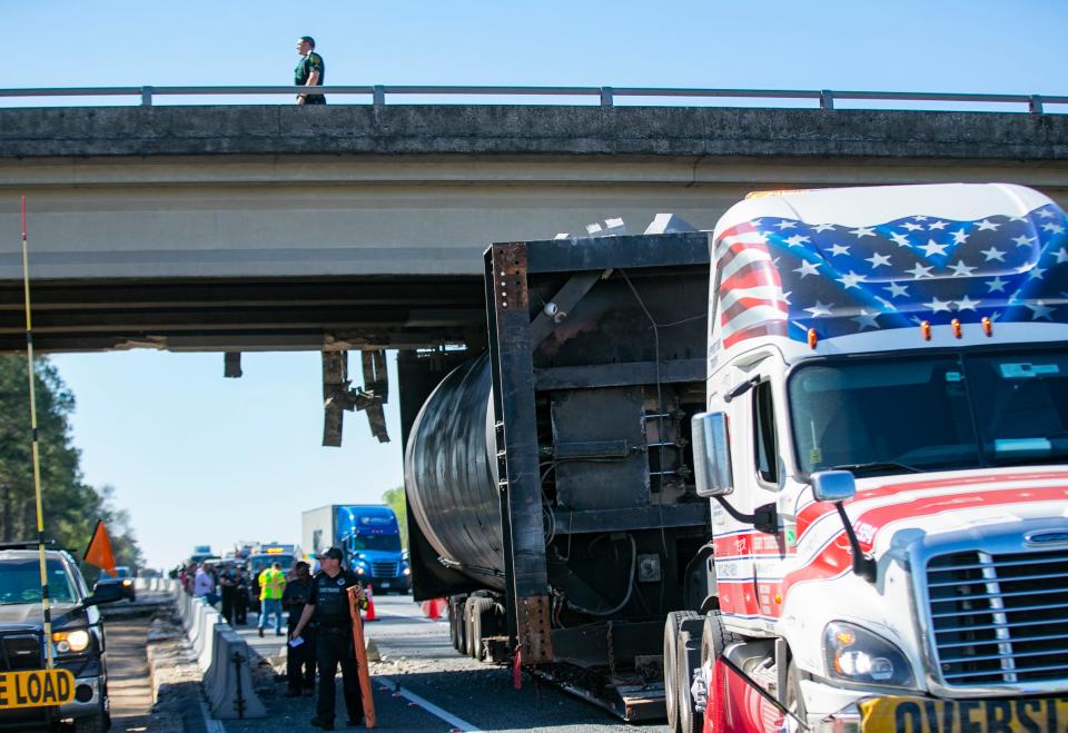 This was the scene Wednesday morning on northbound I-75, where a truck hauling heavy equipment hit the overpass at SW 66th Street (Williams Road.) The damage was still being assessed as noon approached.