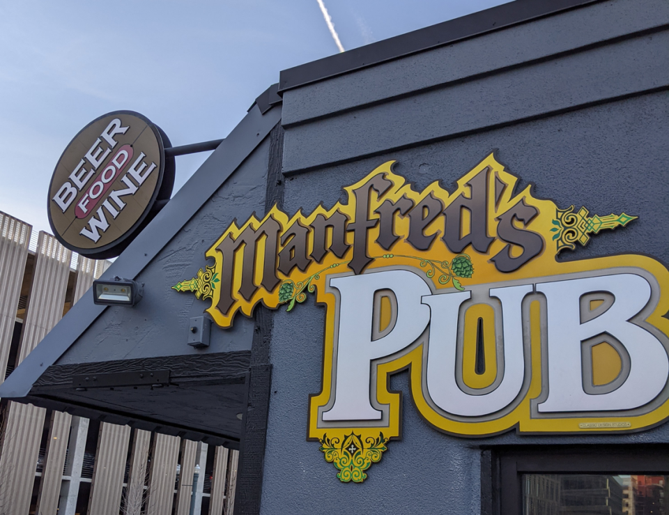 A Manfred’s Pub sign welcomes customers to the former Doc’s Lodge building on Front Street.