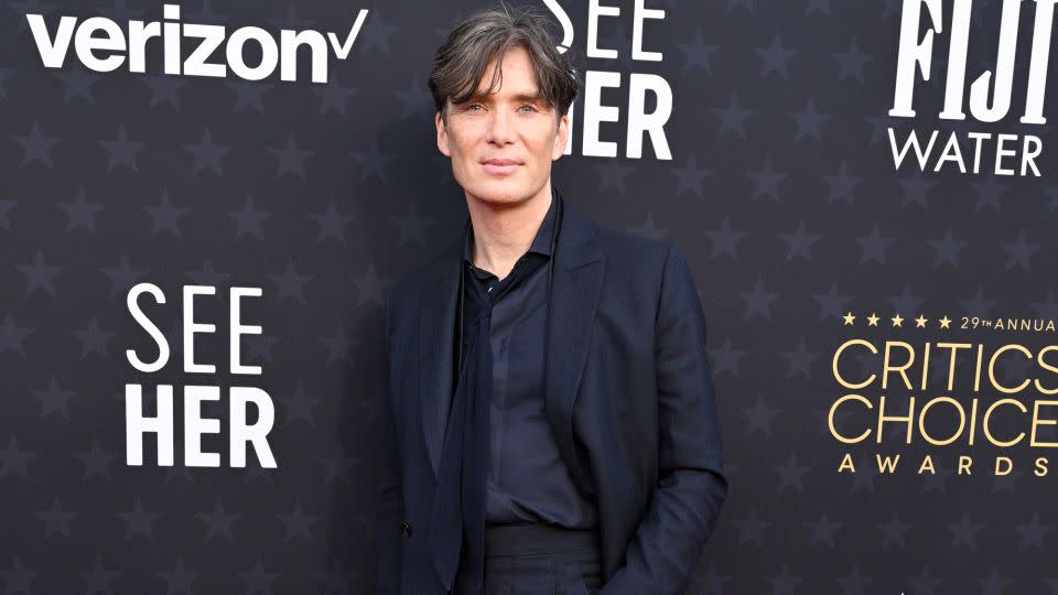Cillian Murphy, nominated for “Oppenheimer,” went for a navy three-piece suit and loosely fitted tie. - Gilbert Flores/Variety/Getty Images