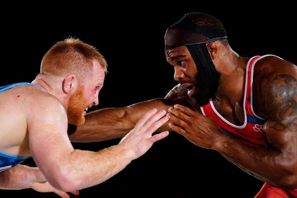 The longtime Olympic dream of former YAIAA star Chance Marsteller, left, truly took off when he finally defeated rival Jordan Burroughs, right, last summer. Here, he lost a tight match to Burroughs in 2022.