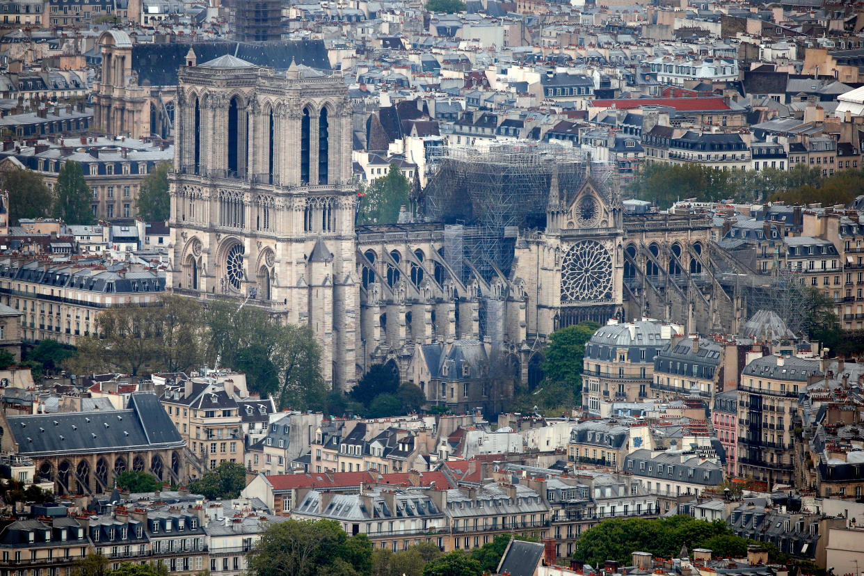 A view shows Notre-Dame Cathedral after a massive fire devastated large parts of the gothic structure in Paris, France, April 16, 2019.    REUTERS/Charles Platiau