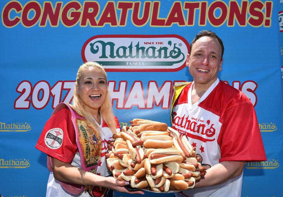 <p>Winners of the Nathan’s Famous Fourth of July International Hot-dog eating contest, Miki Sudo with 41 hotdogs and Joey Chestnut with 72 in Coney Island, New York on July 4, 2017. ( Erik Pendzich/REX/Shutterstock ) </p>