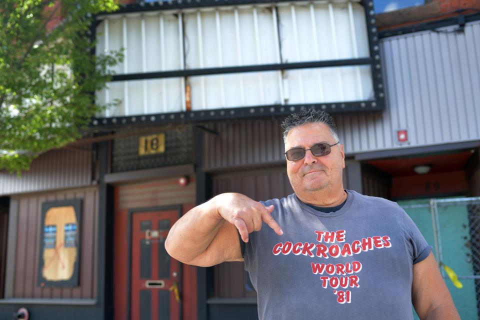 Philip “Pinky” Girouard wears his infamous “The Cockroaches” T-shirt outside of the former Sir Morgan’s Cove. Girouard was the doorman and one of the two bodyguards at Sir Morgan’s Cove when the Rolling Stones played there 40 year ago.