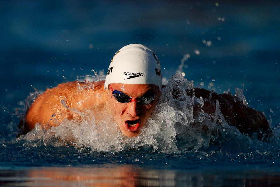 Ryan Murphy competes in the men's 100-meter butterfly heats during the TYR Pro Swim Series at Mission Viejo at Marguerite Aquatics Center on April 8, 2021 in Mission Viejo, California.