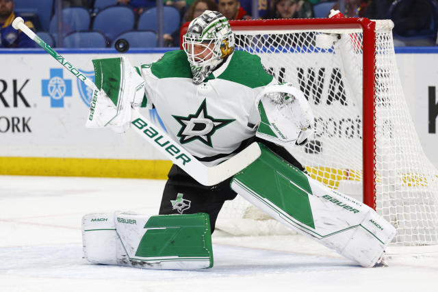 Dallas Stars goaltender Jake Oettinger makes a save during the first period of the team's NHL hockey game against the Buffalo Sabres, Thursday, March 9, 2023, in Buffalo, N.Y. (AP Photo/Jeffrey T. Barnes)