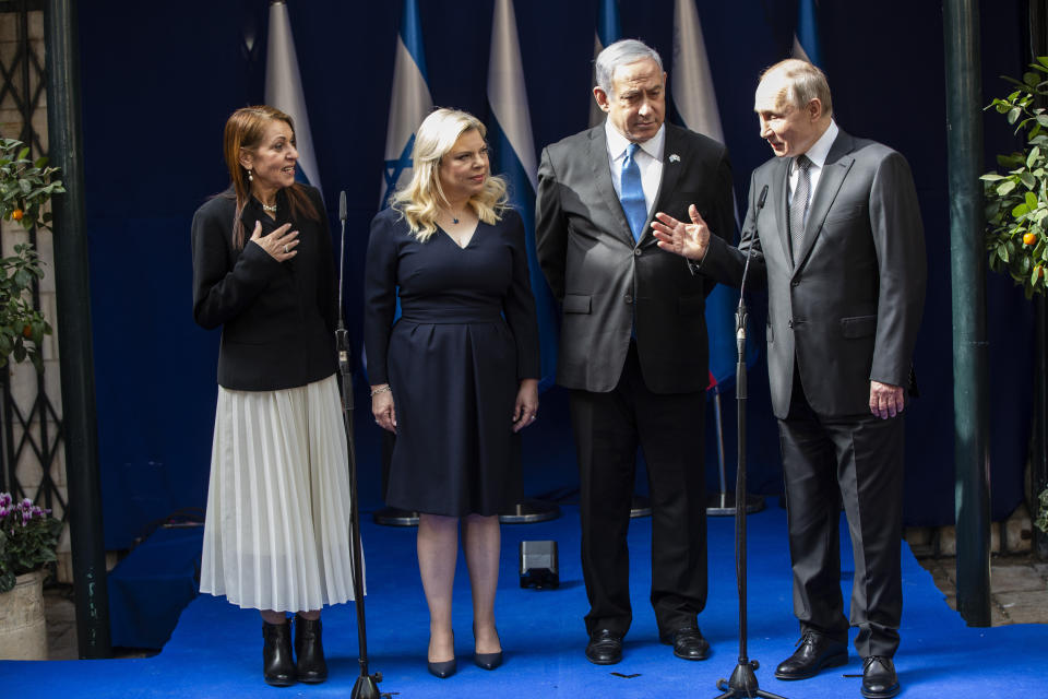 CAPTION CORRECTION:CORRECTS MOTHER'S NAME: Yaffa Issachar, left, mother of Naama, who is imprisoned in Russia on drug possession charges, meets Russian President Vladimir Putin, right, accompanied by Israeli Prime Minister Benjamin Netanyahu and his wife Sarah in Jerusalem on January 23,2020 . Putin, will be a guest of honor Thursday at a ceremony at the Yad Vashem Holocaust Museum marking the 75th anniversary of the Soviet Red Army's liberation of the Nazi Auschwitz death camp. (Heidi Levine, Pool via AP)