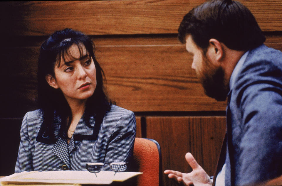 Lorena Bobbitt listens to a lawyer during her trial, Manassas, Virginia, January 1994. Bobbitt was on trial for cutting off her husband's penis; she was acquitted by reason of temporary insanity. | Consolidated News Pictures—Getty Images