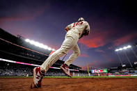 Kansas City Royals right fielder Nate Eaton runs onto the field during the sixth inning of a baseball game against the Los Angeles Dodgers Saturday, Aug. 13, 2022, in Kansas City, Mo. (AP Photo/Charlie Riedel)