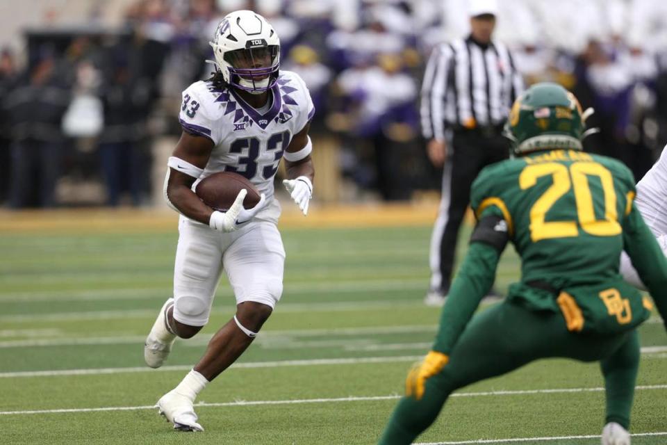 TCU running back Kendre Miller runs the ball during their game against Baylor at McLane Stadium in Waco on Saturday, Nov. 19, 2022. The Horned Frogs won 29-28 against the Bears.