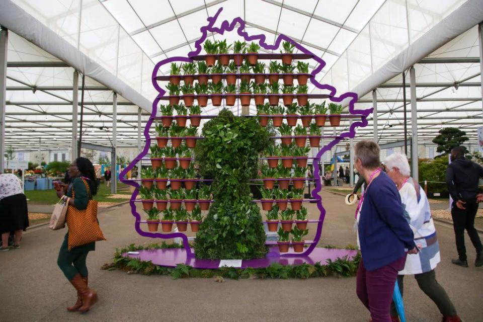 <p>Earlier in the month a number of humble plant pots and lush greenery were used to create just one of the special displays dedicated to the Queen at this year's festival.</p>
