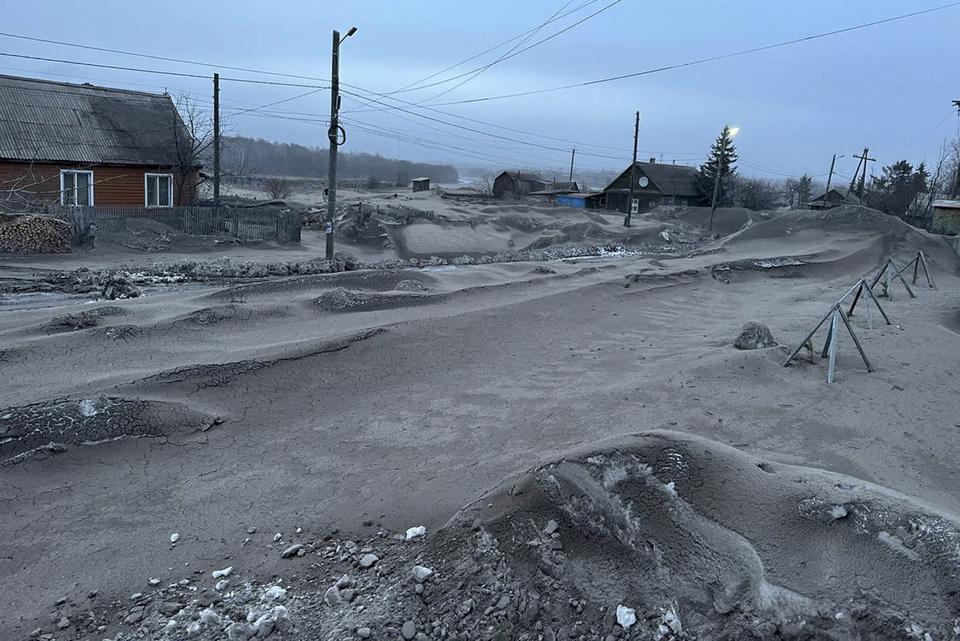 This photo released by the Head of the Ust-Kamchatsky municipal district Oleg Bondarenko on Tuesday, April 11, 2023, shows volcanic ash covers the ground in Kozyrevsk, Ust-Kamchatsky district after the Shiveluch volcano's eruption on the Kamchatka Peninsula in Russian far east. Shiveluch, one of Russia's most active volcanoes, erupted Tuesday, spewing clouds of ash 20 kilometers into the sky and covering broad areas with ash. (The Head of the Ust-Kamchatsky municipal district Oleg Bondarenko via AP)