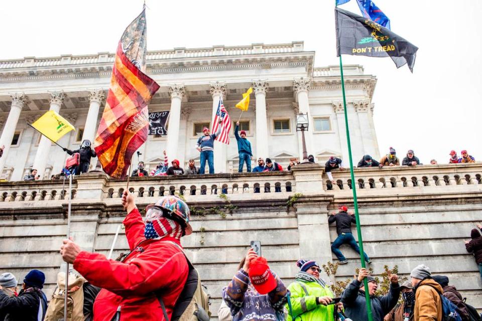 Protestors on the Capitol in Washington on Wednesday, Jan. 6, 2021. The Capitol building was placed on lockdown, with senators and members of the House locked inside their chambers, as Congress began debating President-elect Joe Biden’s victory. President Trump addressed supporters near the White House before protesters marched to Capitol Hill. (Jason Andrew/The New York Times)