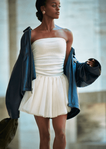 Classic studio fashion editorial on black and white film with a tulle dress