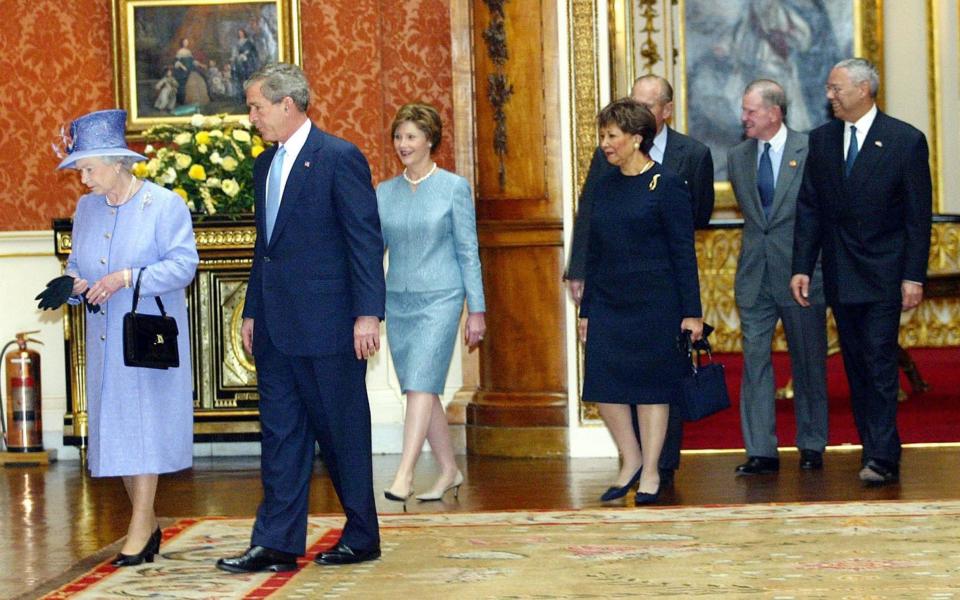 Queen Elizabeth II accompanying the then President George W. Bush, his wife Laura, the then US Secretary of State Colin Powell and his wife Alma Powell, and the Duke of Edinburgh as they enter the Queen's Gallery at Buckingham Palace -  PA/PA Wire