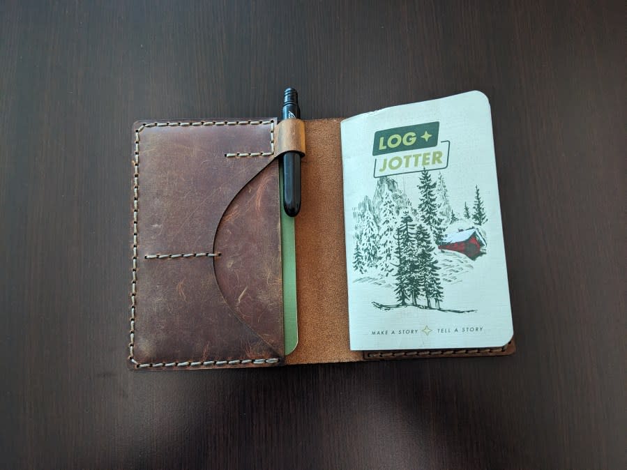 Galen Leather notebook cover with Rite in the Rain pocket pen and Log + Jotter notebook. Photo by Dave Burge/KTSM