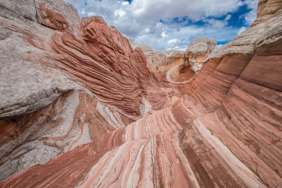 <p><strong>Where: </strong><a href="https://go.redirectingat.com?id=74968X1596630&url=https%3A%2F%2Fwww.tripadvisor.com%2FTourism-g143012-Badlands_National_Park_South_Dakota-Vacations.html&sref=https%3A%2F%2Fwww.prevention.com%2Flife%2Fg26815809%2Fmost-beautiful-places-in-america%2F" rel="nofollow noopener" target="_blank" data-ylk="slk:Badlands National Park, South Dakota;elm:context_link;itc:0;sec:content-canvas" class="link ">Badlands National Park, South Dakota</a><strong><br></strong><strong><br>Why We Love It: </strong>The word "badlands" is probably not the first thing you think of when you're imagining a beautiful place, but this spot is gorgeous. Not only are the rock formations incredible, but they also possess "one of the world’s richest fossil beds," according to the <a href="https://www.nps.gov/badl/index.htm" rel="nofollow noopener" target="_blank" data-ylk="slk:U.S. National Park Service website;elm:context_link;itc:0;sec:content-canvas" class="link ">U.S. National Park Service website</a>. </p>