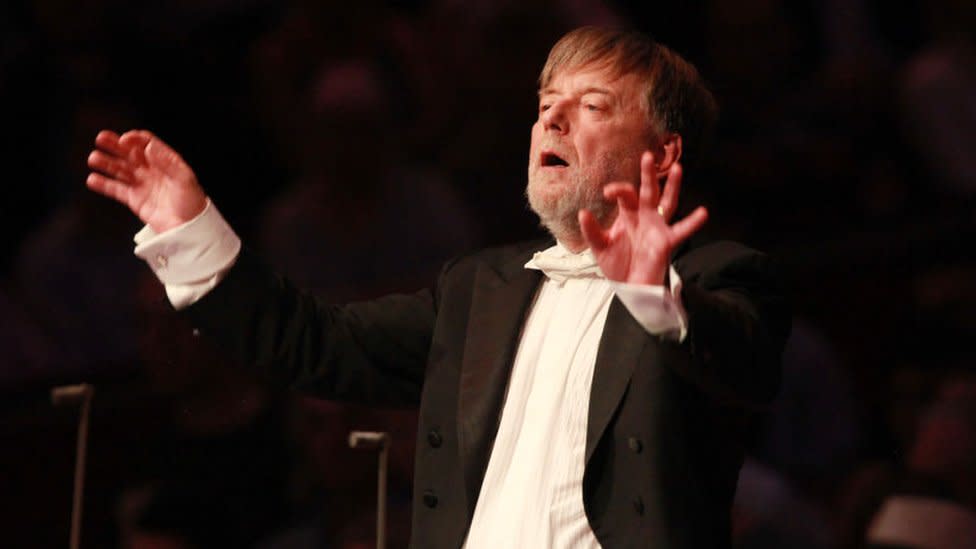Conductor Sir Andrew Davis leads the BBC Symphony Orchestra and Chorus in 'The Kingdom' by composer Edward Elgar on stage for the First Night Of The Proms at Royal Albert Hall on July 18, 2014