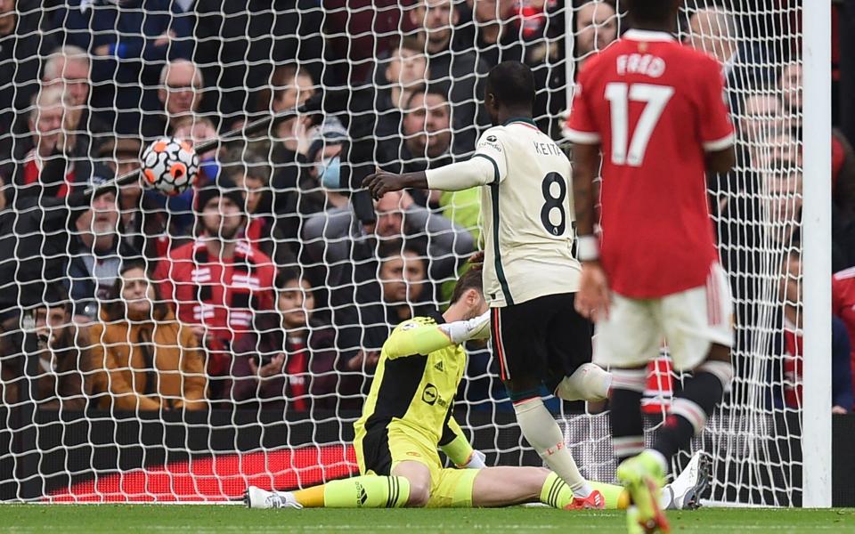 Naby Keita scores the opening goal for Liverpool at Old Trafford - AFP