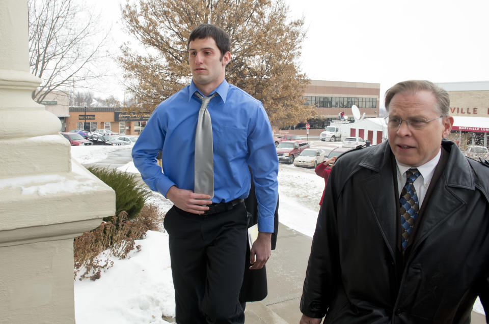 Matthew Barnett walks into the courthouse with his legal counsel J.R. Hobbs for a hearing on Thursday, Jan. 9, 2014 in Maryville, Mo. Barnett is accused of sexually assaulting a 14-year-old schoolmate when he was 17 has been charged with misdemeanor child endangerment. Special prosecutor Jean Peters Baker has been re-examining the girl's allegations that Barnett raped her at a January 2012 house party, when he was a Maryville High School senior and she was a freshman. (AP Photo/The Kansas City Star, The Kansas City Star) KANSAS CITY OUT