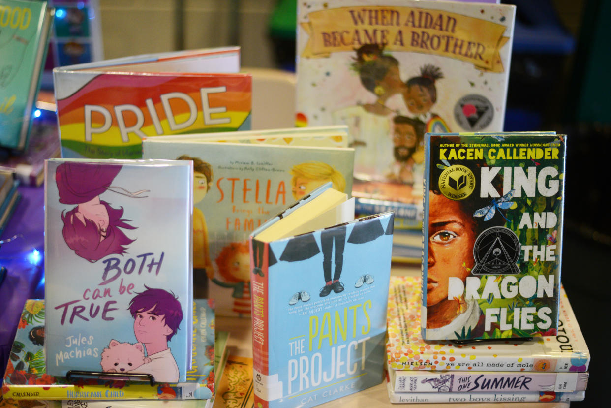 Children books that are fighting for survival at public schools because of their LGBTQ content are displayed at the annual Pride Town Hall at Walter Johnson High School in Bethesda, MD, May 21, 2022. (Astrid Riecken for The Washington Post via Getty Images)