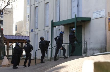 French police officers are seen during an operation to secure the Castellane housing area in Marseille, February 9, 2015. REUTERS/Philippe Laurenson