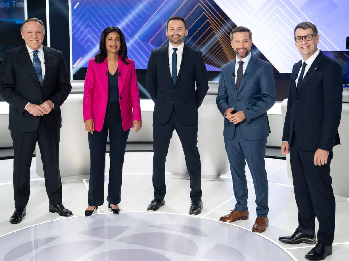 Coalition Avenir Québec Leader Francois Legault, Quebec Liberal Leader Dominique Anglade, Parti Québécois Leader Paul St-Pierre Plamondon, Québec Solidaire Leader Gabriel Nadeau-Dubois and Conservative Party of Quebec Leader Éric Duhaime pose on set prior to a leaders debate in Montreal. (Paul Chiasson/The Canadian Press - image credit)