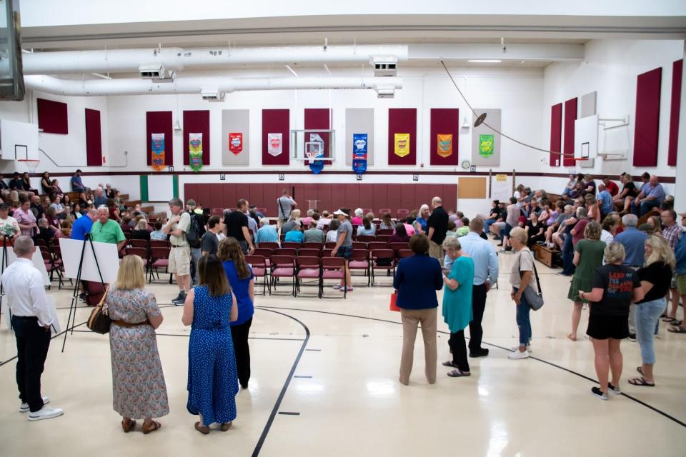More than 180 people attended a public informational meeting about the potential sale of New Concord Elementary and surrounding property.