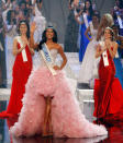 Miss Venezuela Ivian Sarcos waves after she is crowned winner of the Miss World 2011 competition at Earls Court in London.<br>