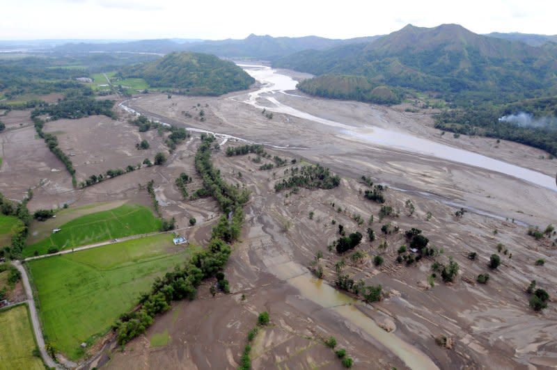 Flooding is widespread on Panay Island, Philippines, on June 27, 2008, where the US Navy is helping to provide humanitarian assistance and disaster response in the wake of Typhoon Fengshen. On June 21, 2008, nearly 1,400 people, most of them on a ferry that capsized, were killed in the typhoon. File Photo by Spike Call/U.S. Navy