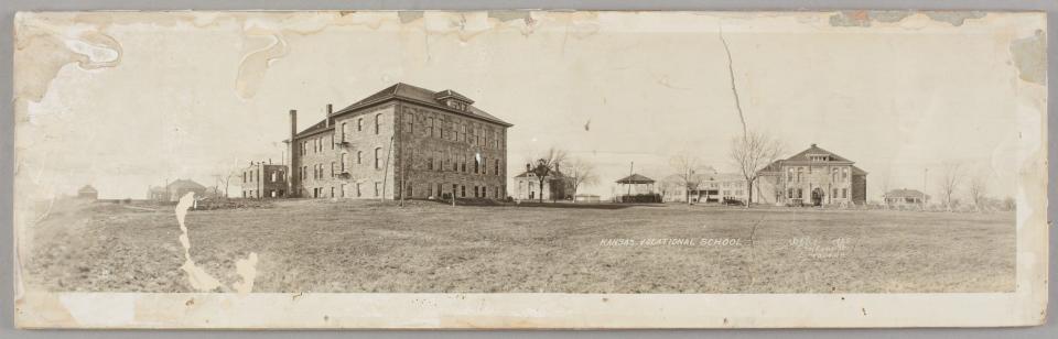 A panoramic photograph shows the Kansas Vocational School in Topeka.