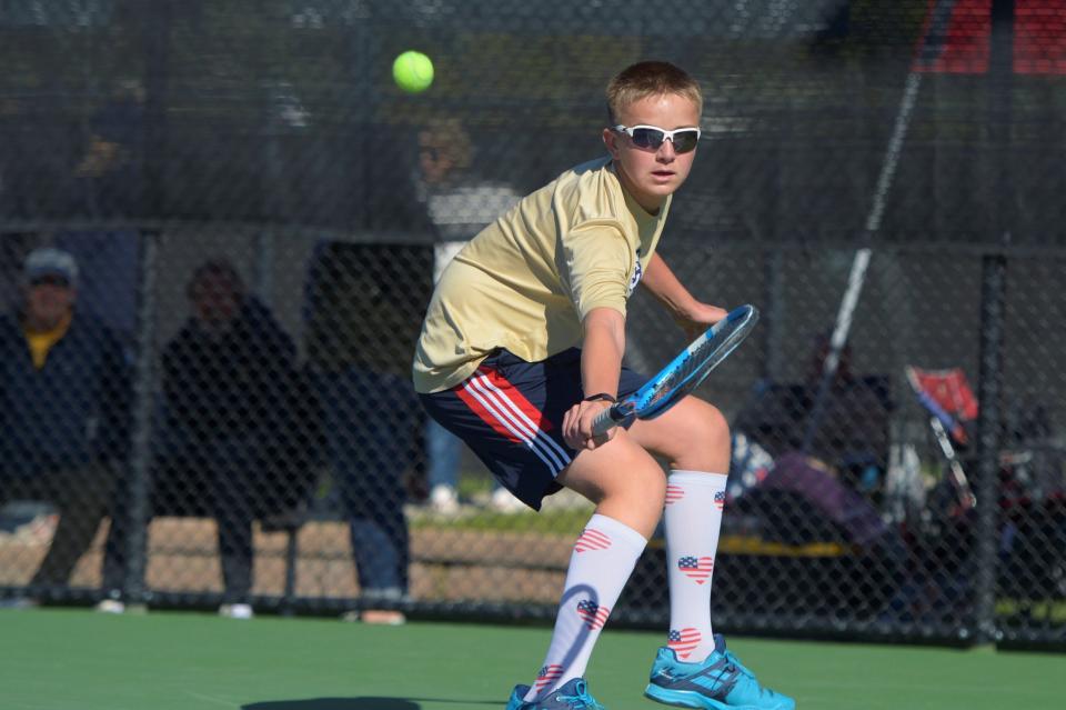 Fort Collins boys tennis player Grubby Hay-Arthur hits a shot during the Class 5A state tournament at Gates Tennis Center on Thursday, Oct. 14, 2021. Hay-Arthur qualified again this season on the No. 3 doubles line with partner Vic Hubbard.