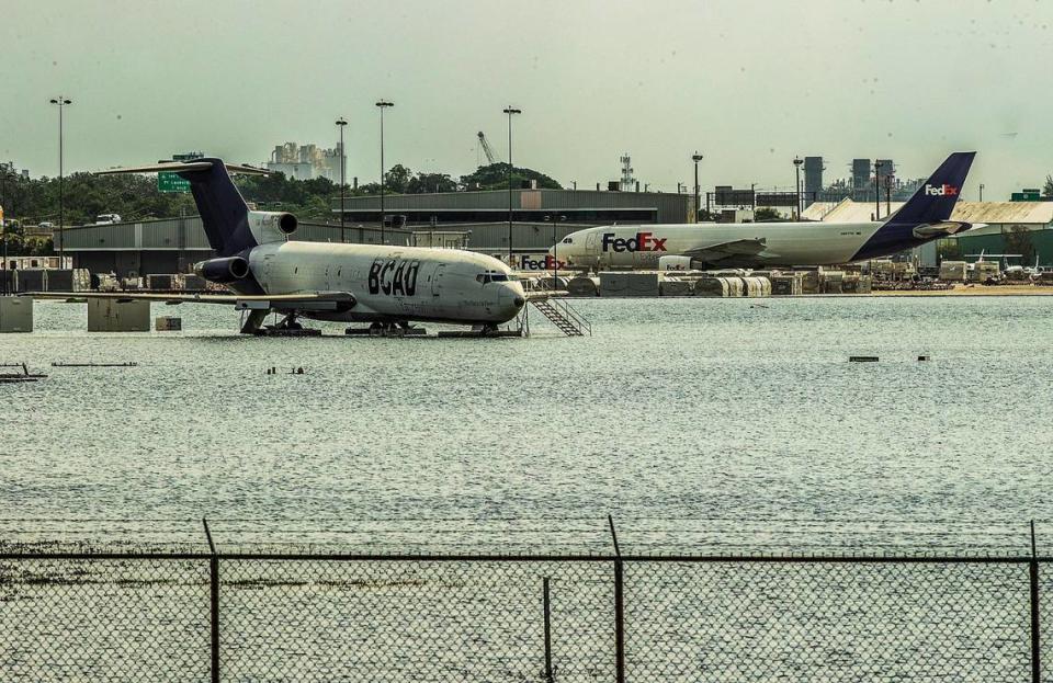 BCAD Express and Fedex airplanes grounded on the tarmac as the Fort Lauderdale-Hollywood International Airport is closed while the runway remains flooded on Thursday April 13, 2023, due to heavy rain that affected Broward County for the last two days.