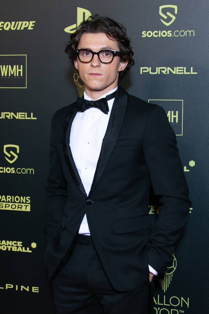 Tom Holland in a tux and eye glasses at the Ballon D'or ceremony