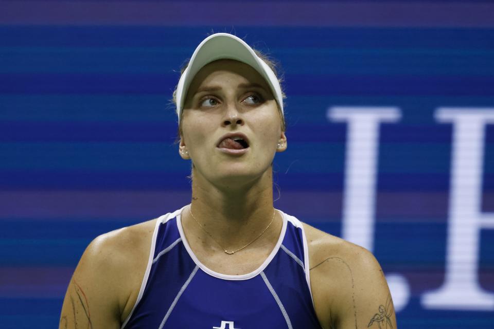 Marketa Vondrousova, of the Czech Republic, reacts against Madison Keys, of the United States, during the quarterfinals of the U.S. Open tennis championships, Wednesday, Sept. 6, 2023, in New York. (AP Photo/Jason DeCrow)