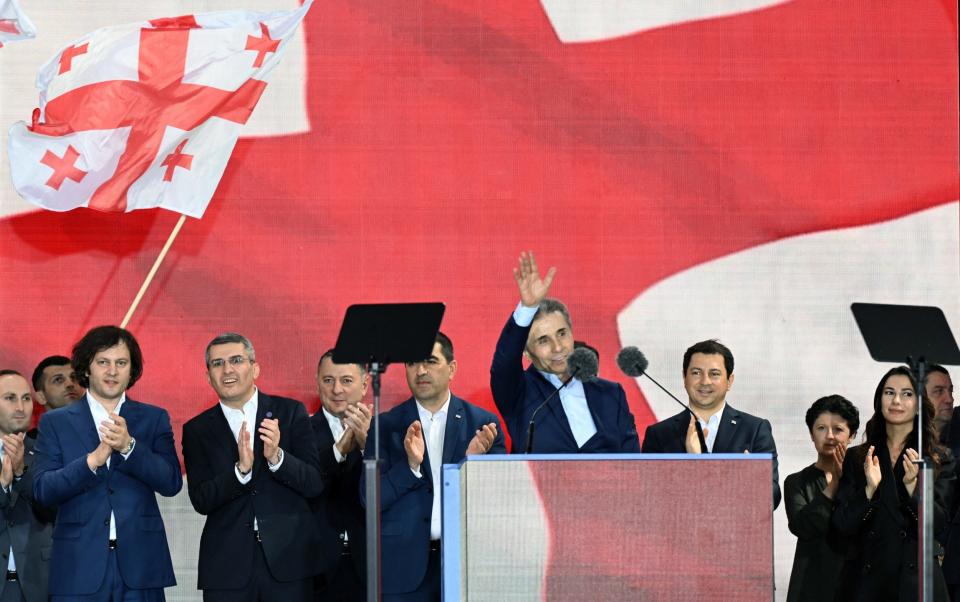 Georgian billionaire Bidzina Ivanishvili addresses the crowd during a rally organised by the ruling Georgian Dream party