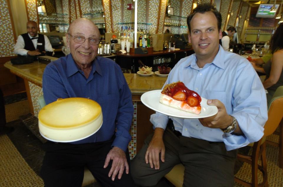 Rosen with his father, Walter Rosen, inside the Junior’s Times Square location in 2006. Matthew McDermott