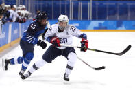 <p>Kacey Bellamy #22 of the United States collides with Minnamari Tuominen #15 of Finland during the Women’s Ice Hockey Preliminary Round – Group A game on day two of the PyeongChang 2018 Winter Olympic Games at Kwandong Hockey Centre on February 11, 2018 in Gangneung, South Korea. (Photo by Ronald Martinez/Getty Images) </p>