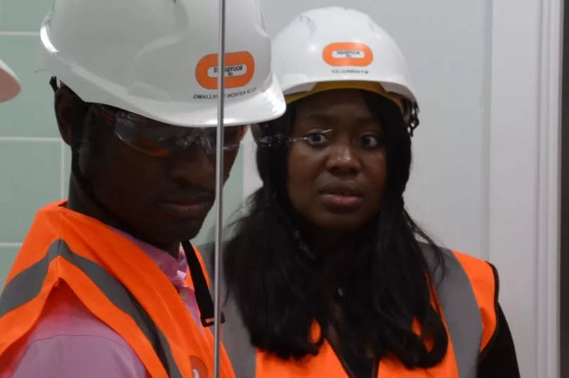 Miatta Fahnbulleh (right) with local councillor Michael Situ during a visit to the Tustin estate on the Old Kent Road on Friday (June 21)