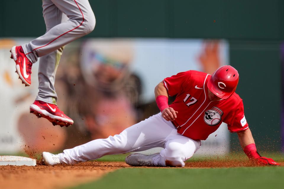 Cincinnati Reds left fielder Stuart Fairchild (17) steals second base in the third inning during a MLB spring training baseball game, Sunday, Feb. 25, 2024, at Goodyear Ballpark in Goodyear, Ariz.