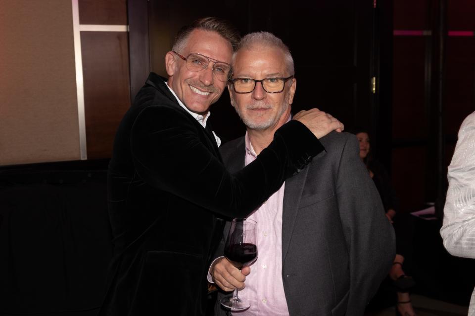 Jonathan Wynne and Chuck Yates show some love at "A Night to Remember," the Cathedral City Senior Center's fundraising gala, on Nov. 13, 2023.