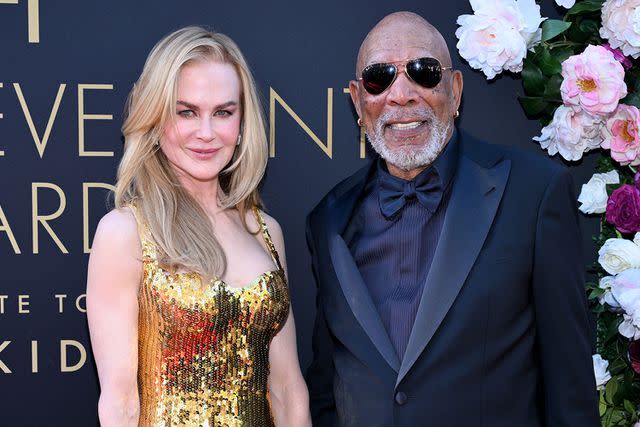 <p>Michael Kovac/Getty</p> Nicole Kidman and Morgan Freeman at the AFI Life Achievement Award Gala