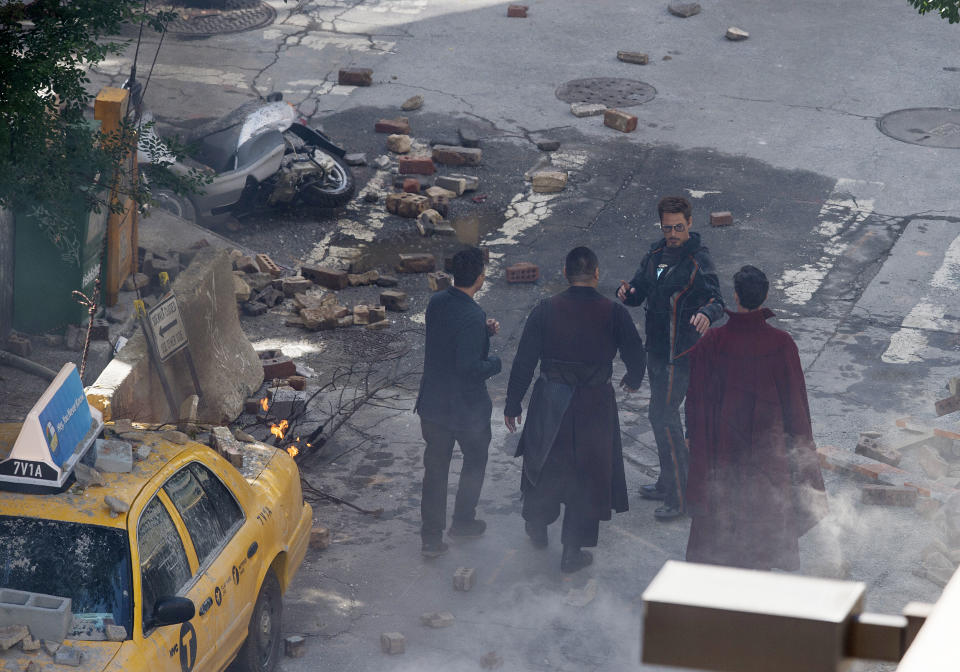 FILE - Cast members, from left, Mark Ruffalo, Benedict Wong, Robert Downey Jr. and Benedict Cumberbatch, appear on location in Atlanta during the filming of "Avengers: Infinity Wars" on June 26, 2017. (AP Photo/Mike Stewart, File)