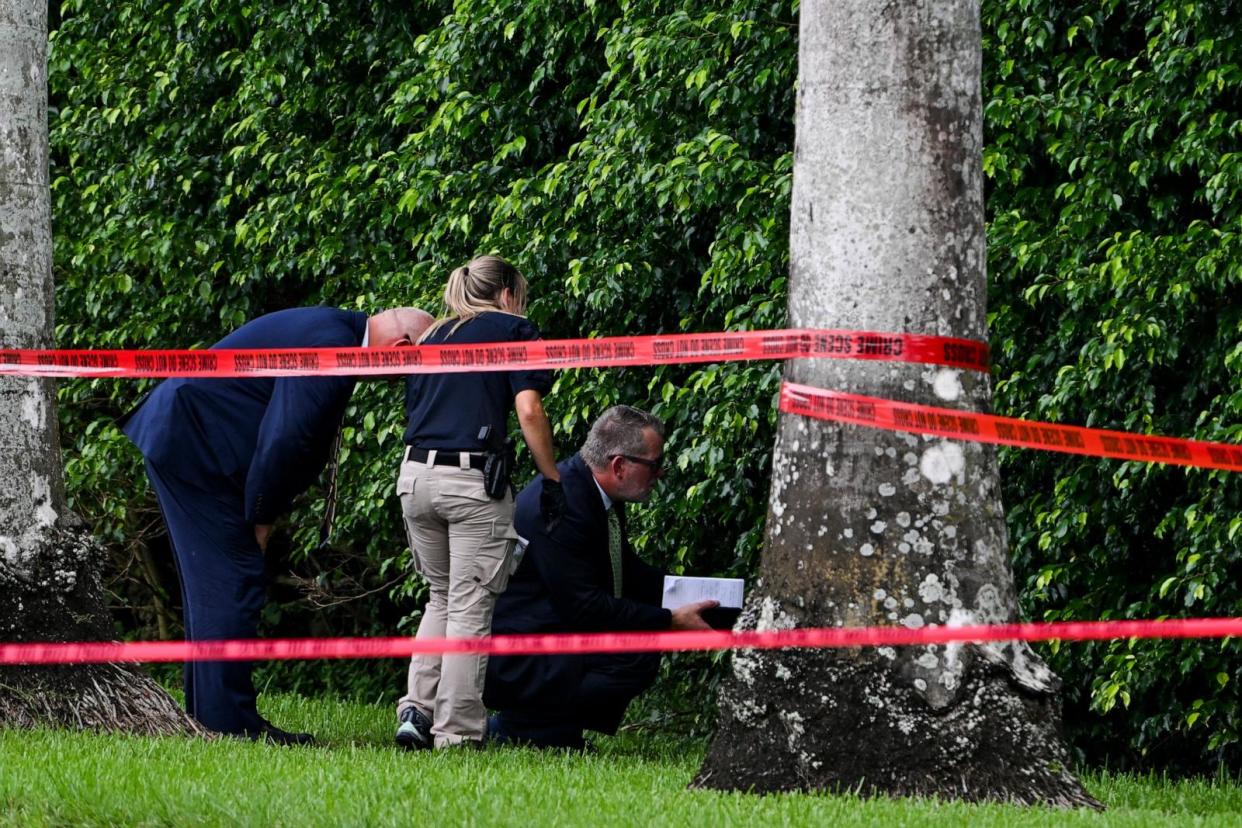 Law enforcement officers work at the crime scene outside Trump International Golf Club in West Palm Beach, Florida, on September 16, 2024, following the attempted assassination of former President Donald Trump. (Chandan Khanna/AFP via Getty Images)