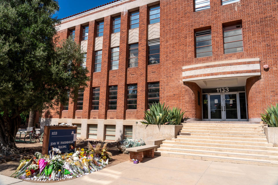 Flowers decorate a memorial for Dr. Thomas Meixner, professor and head of the Department of Hydrology and Atmospheric Sciences at the University of Arizona, in Tucson on Oct. 8, 2022. Meixner was fatally shot on campus Oct. 5.