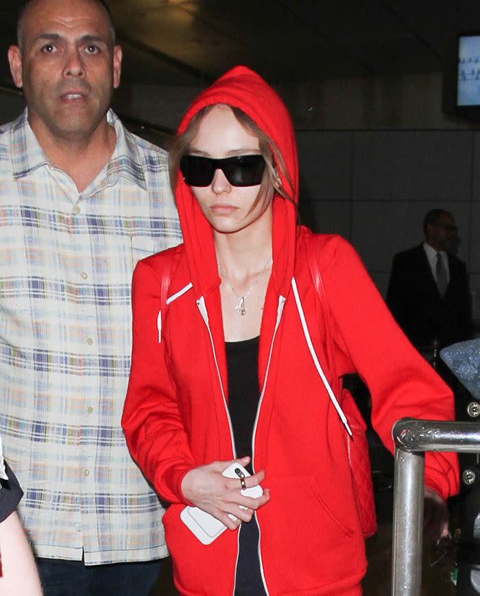 Lily Rpse appeared casual and make-up free as she walked through LAX. Source: Splash