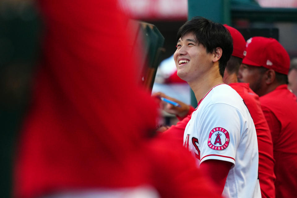 ANAHEIM, CA - JULY 05:  Shohei Ohtani #17 of the Los Angeles Angels smiles in the dugout during the game between the Boston Red Sox and the Los Angeles Angels at Angel Stadium on Monday, July 5, 2021 in Anaheim, California. (Photo by Daniel Shirey/MLB Photos via Getty Images)