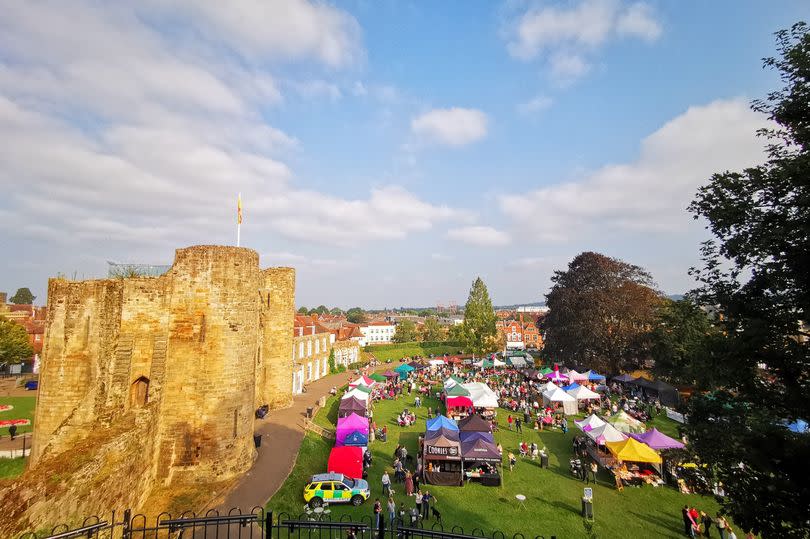 Tonbridge Food and Drink Festival has lots for the children to enjoy - lovely pic of castle in the sun, with stalls in the grounds and people